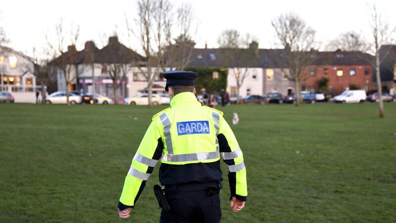 Gardaí move on crowds that gathered in sunshine at Cork parks