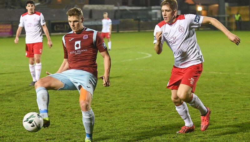 Cobh Ramblers' Ian Turner controls the ball as Shelbourne's Oscar Brennan closes in. Picture: David Keane.