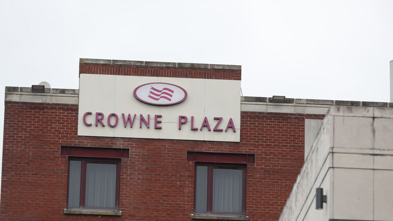 Government will learn lessons from quarantine hotel breaches, says Coveney
