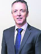 George Mills, Managing Director of Johnson &amp; Perrott Motor Dealerships.