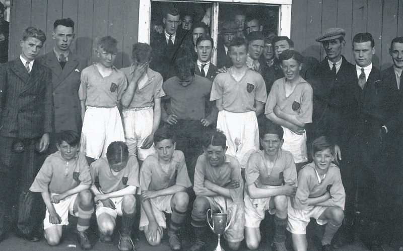 Celtic Utd, MFA Schoolboys Cup and Shield winners 1938. Back: F Cahilane, J Bickerstaffe, Con 'Brasso' McCarthy, Mick Kenefick, Dave McGrath, J Power, Freddie Richmond, S Furlong, C Rea, T Foley or T Cahilane, P Bickerstaffe. Front: D Buckley, B Murphy, S Mulcahy, Paddy Noonan (c), M Murphy, Christy Quinn. The lad with his hand up to his face, Mick Kenefick, was then a hurler with North Mon and captained Cork to win the 1943 All-Ireland title. Freddie Richmond another Harty Cup winner smiled for the camera.