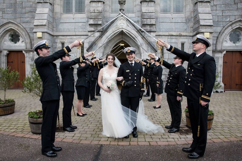 Clare and Cian getting a guard of honour outside the church in Ballincollig