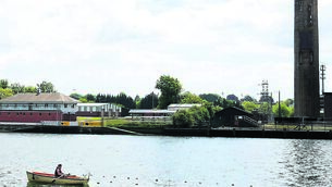 <p class="contextmenu internal_Caption">OLD POWER: The chimney stack of the ESB Marina Power station has been there since 1954, and is now retired.</p>