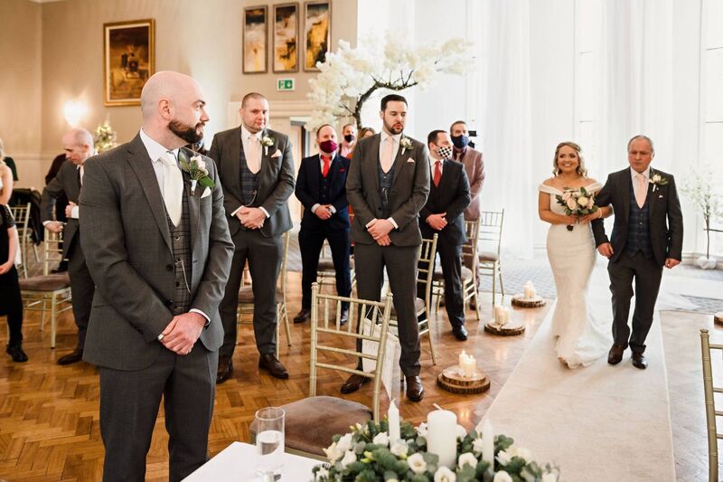 Sonya walking down the aisle, at their spiritual ceremony in Castle Oaks Hotel, Limerick.
