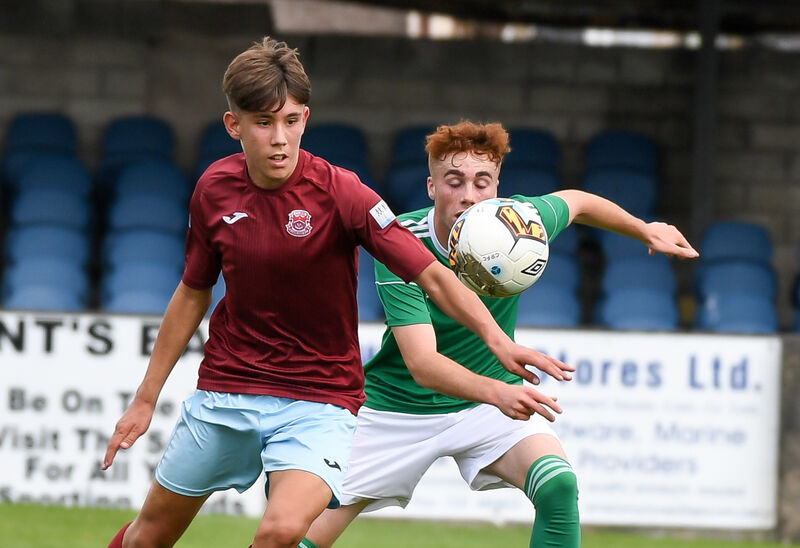  Cobh Ramblers' David Bosnjak battling for possession with Cork City's Matthew O'Reilly. Picture: David Keane.