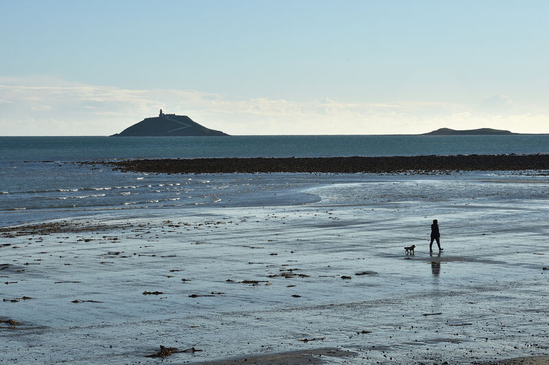 Walking on the beach at Garryvoe, Co Cork. Walking on the beach at Garryvoe, Co Cork.