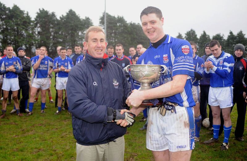 Des Cullinane presenting the Higher Education League trophy to the captain of the victorious Garda Training College team Michael Cussen. Picture Des Barry Des Cullinane presenting the Higher Education League trophy to the captain of the victorious Garda Training College team Michael Cussen. Picture Des Barry