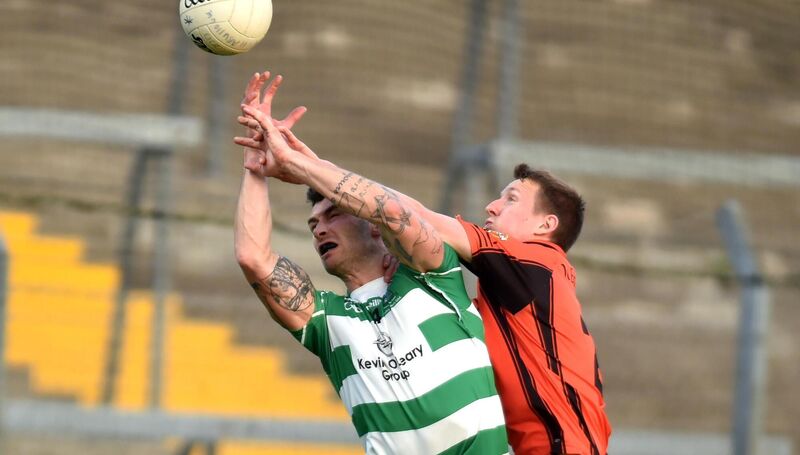 Valley Rovers' Fiachra Lynch battles Duhallow's John Mcloughlin. Picture: Eddie O'Hare