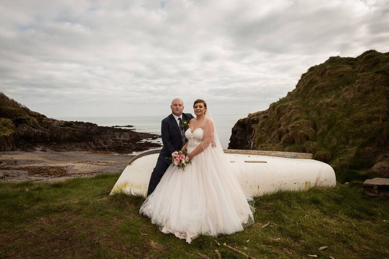 SPECIAL DAY: The couple at Sandy Cove beach on the day of their wedding. They were upset that they couldn’t have more people attend, however they had a wonderful day, filled with love and best wishes. SPECIAL DAY: The couple at Sandy Cove beach on the day of their wedding. They were upset that they couldn’t have more people attend, however they had a wonderful day, filled with love and best wishes.