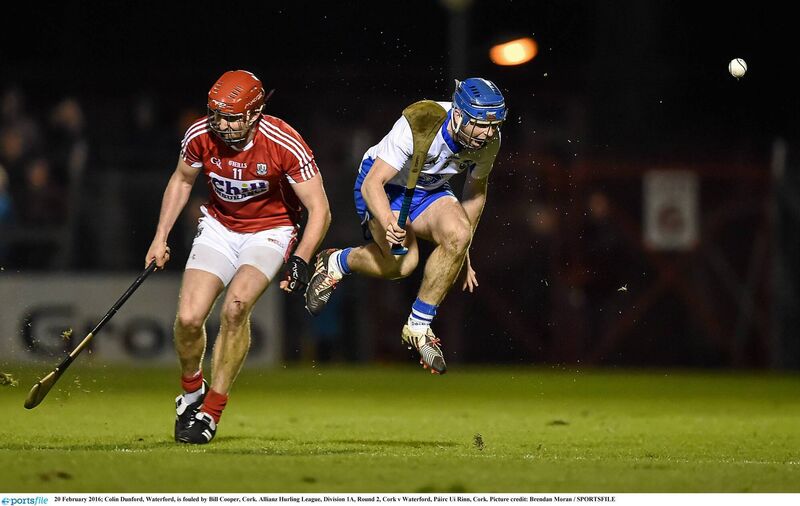 Colin Dunford, Waterford, is fouled by Bill Cooper, Cork, in the 2016 Allianz Hurling League at Páirc Uí Rinn. Picture: Brendan Moran/SPORTSFILE