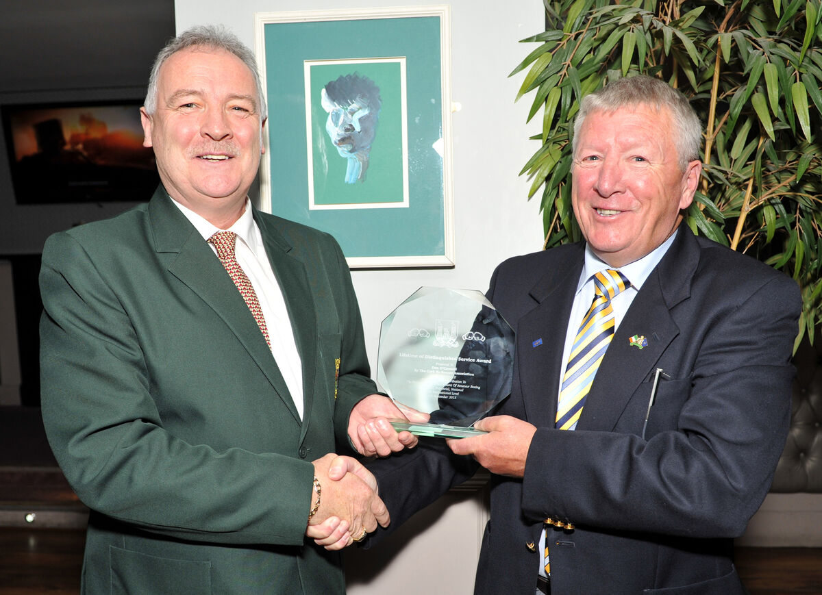 Award Sponsor Conal Thomas of Conals Tree Services presenting a Lifetime Distinguished Service Award to Dan O'Connell in recognition of over 40 years service to sports in general and in particular to boxing at local, national and international levels. Picture: Doug Minihane