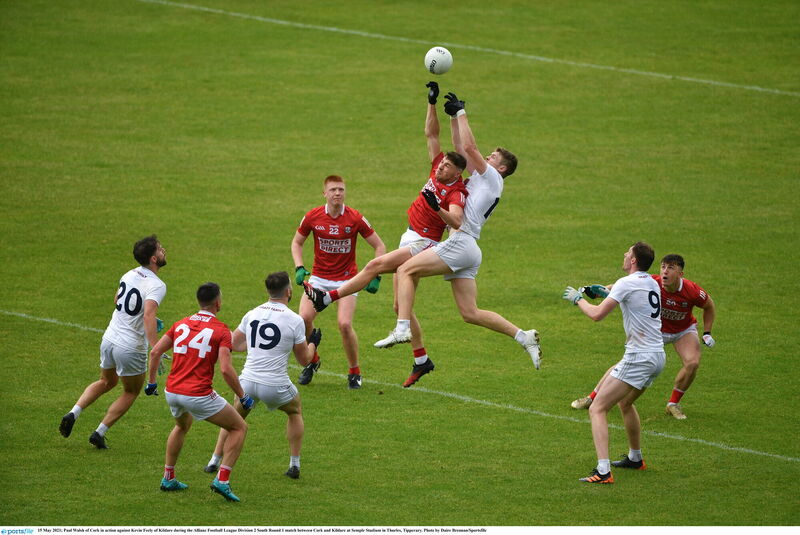 Paul Walsh of Cork in action against Kevin Feely of Kildare. Picture: Daire Brennan/Sportsfile