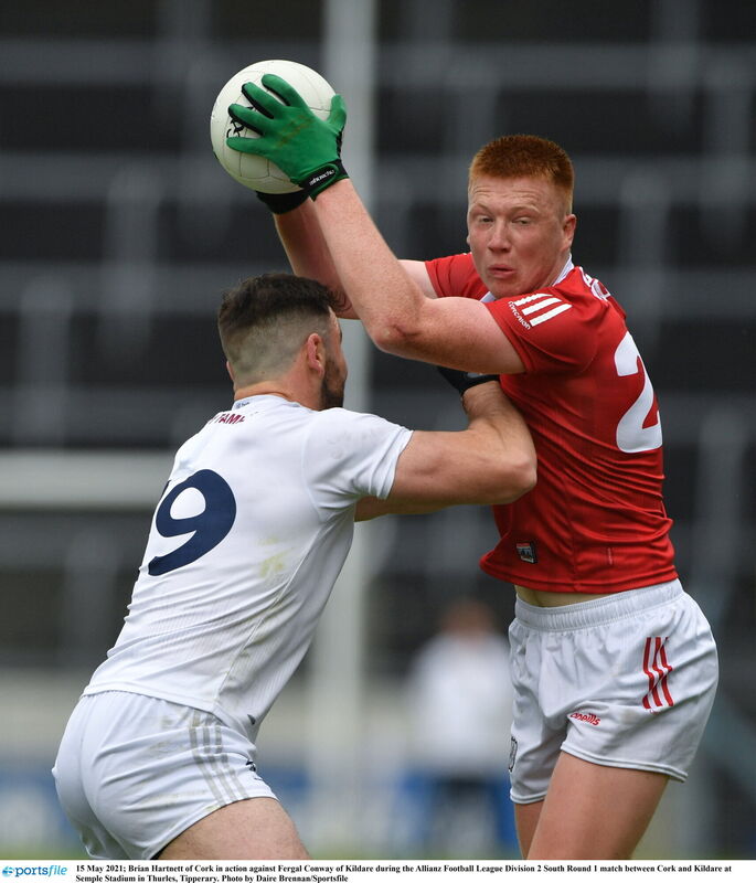 Brian Hartnett of Cork in action against Fergal Conway of Kildare. Picture: Daire Brennan/Sportsfile