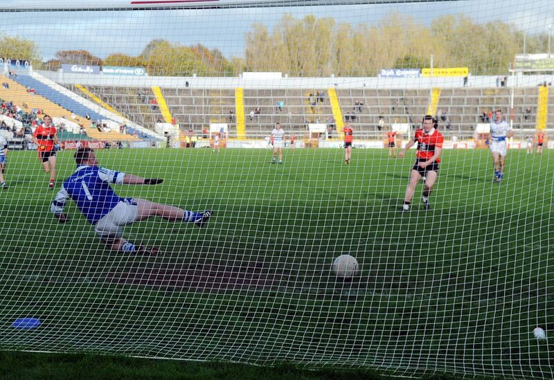 UCC's Daithí Casey slots the penalty past Castlehaven goalkeeper Paudie Hurley in 2011. Picture: Eddie O'Hare
