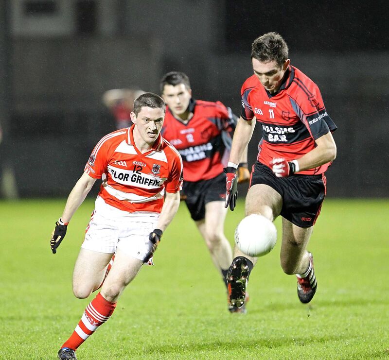 Shane Beston, Mitchelstown, is chased by John Duggan, Courcey Rovers. Picture. Jim Coughlan.