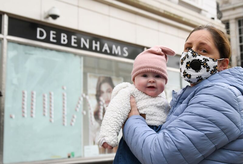 Claire O'Leary, one of the ex-Debenhams workers, pictured with her daughter Grace, who was born in November, outside the former Debenhams store on Patrick St., Cork, at the end of their 406 day struggle for justice. Picture Denis Minihane. Claire O'Leary, one of the ex-Debenhams workers, pictured with her daughter Grace, who was born in November, outside the former Debenhams store on Patrick St., Cork, at the end of their 406 day struggle for justice. Picture Denis Minihane.