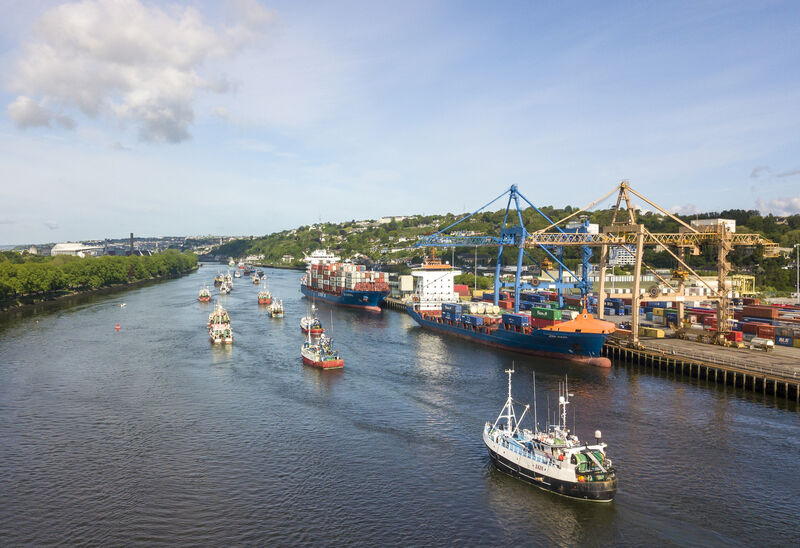  The flotilla of fishing boats passing Tivoli Docks on their way to the Port of Cork. Picture Dan Linehan