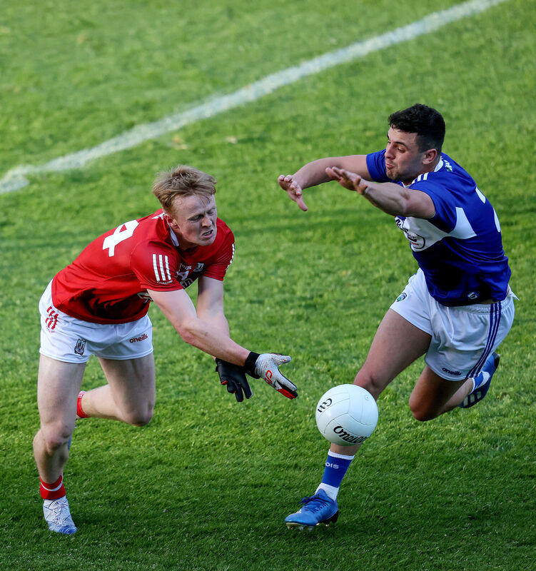 Cork's Damien Gore and Robert Pigott of Laois battle for possession. Picture: INPHO/Bryan Keane Cork's Damien Gore and Robert Pigott of Laois battle for possession. Picture: INPHO/Bryan Keane