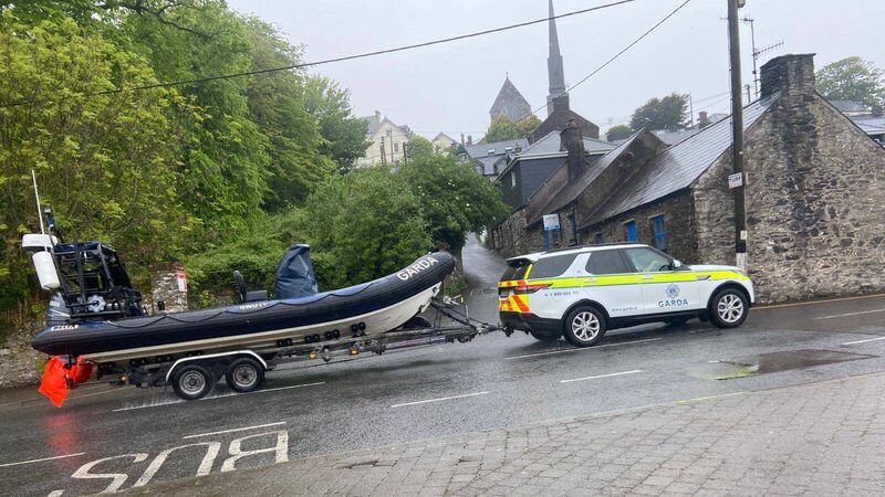LATEST: Garda divers arrive at scene to search car found submerged in Cork, vehicle believed to be linked to missing person case
