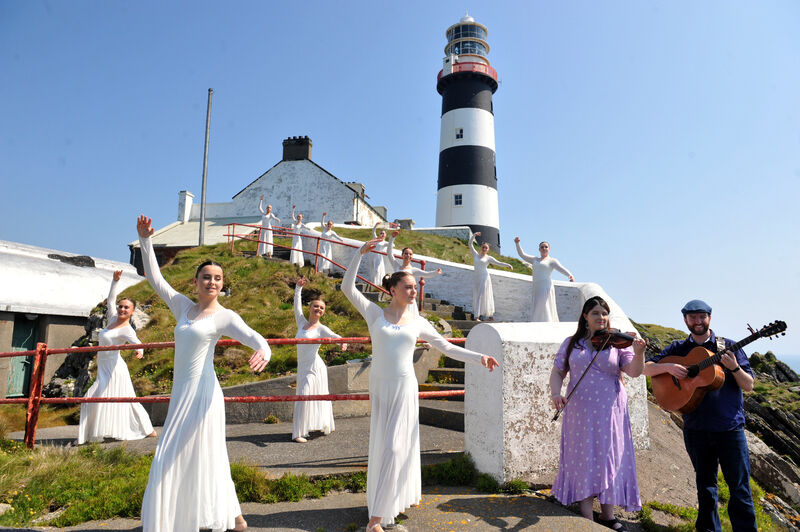 Fifty six dance students of Joan Denise Moriarty School of Dance are recording a dance video ahead of Cruinniú na nÓg next month. Some of the senior girls danced at the lighthouse on the Old Head of Kinsale, Co Cork on the Wild Atlantic Way on Sunday. Included are musicians Abby Ní Loingsigh on vocals and fiddle and Stephen O'Dea on guitar. Picture: Larry Cummins Fifty six dance students of Joan Denise Moriarty School of Dance are recording a dance video ahead of Cruinniú na nÓg next month. Some of the senior girls danced at the lighthouse on the Old Head of Kinsale, Co Cork on the Wild Atlantic Way on Sunday. Included are musicians Abby Ní Loingsigh on vocals and fiddle and Stephen O'Dea on guitar. Picture: Larry Cummins