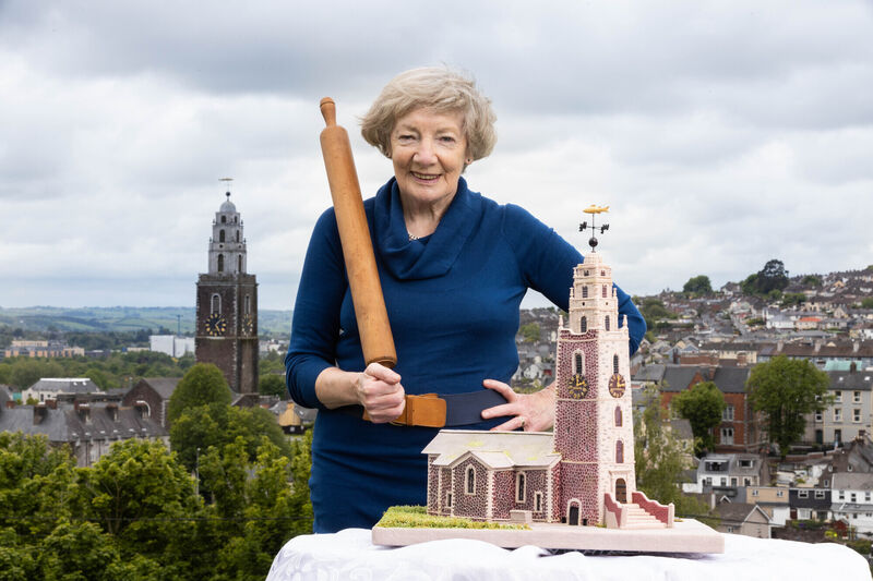 Sugar sculptor Maureen Timpson with her replica of St Anne’s Shandon which has been created entirely in sugarcraft. Picture: Darragh Kane Sugar sculptor Maureen Timpson with her replica of St Anne’s Shandon which has been created entirely in sugarcraft. Picture: Darragh Kane
