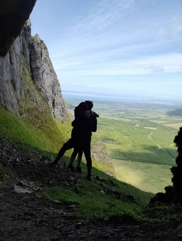The couple embrace at Diarmuid and Grainne's cave.