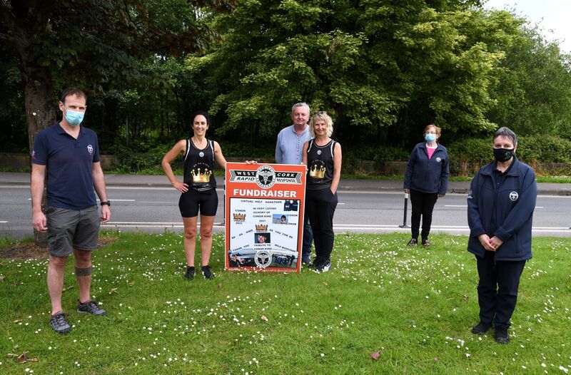 Imelda Marshall pictured socially distanced at the finish with Conor's parents Eamonn and Maura (centre) and members of West Cork Rapid Response Eamonn Barry, Betty Hennessy (back right) and Kate Crowley. Picture: Denis Minihane. Imelda Marshall pictured socially distanced at the finish with Conor's parents Eamonn and Maura (centre) and members of West Cork Rapid Response Eamonn Barry, Betty Hennessy (back right) and Kate Crowley. Picture: Denis Minihane.