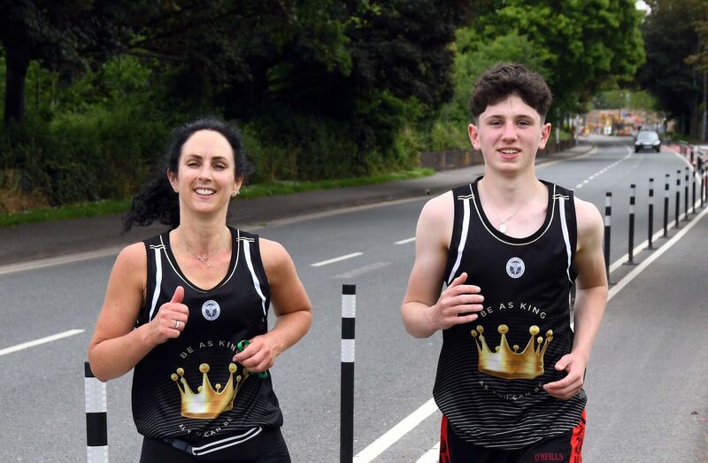 Imelda Marshall with her son James at the finish in Cork, after completing her half-marathon. Picture: Denis Minihane. Imelda Marshall with her son James at the finish in Cork, after completing her half-marathon. Picture: Denis Minihane.