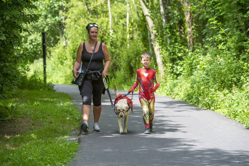Lenore Good who is climbing Kilmanjaro this August pictured with her son Bodhi, doing their 5km walk on Saturday. Picture: Dan Linehan