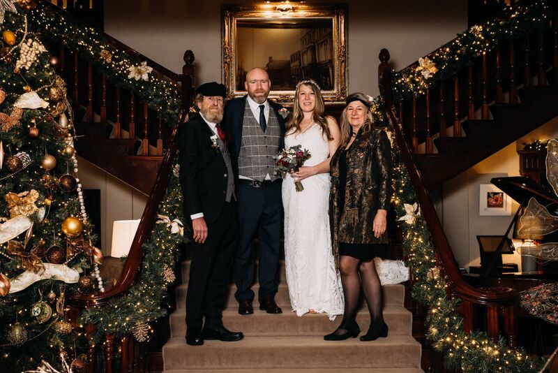 The couple with their family. The couple with their family.