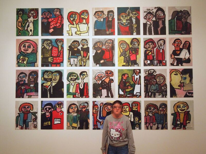 Yvonne Condon with a wall of portraits of people of Cork, at a previous exhibition. Yvonne Condon with a wall of portraits of people of Cork, at a previous exhibition.