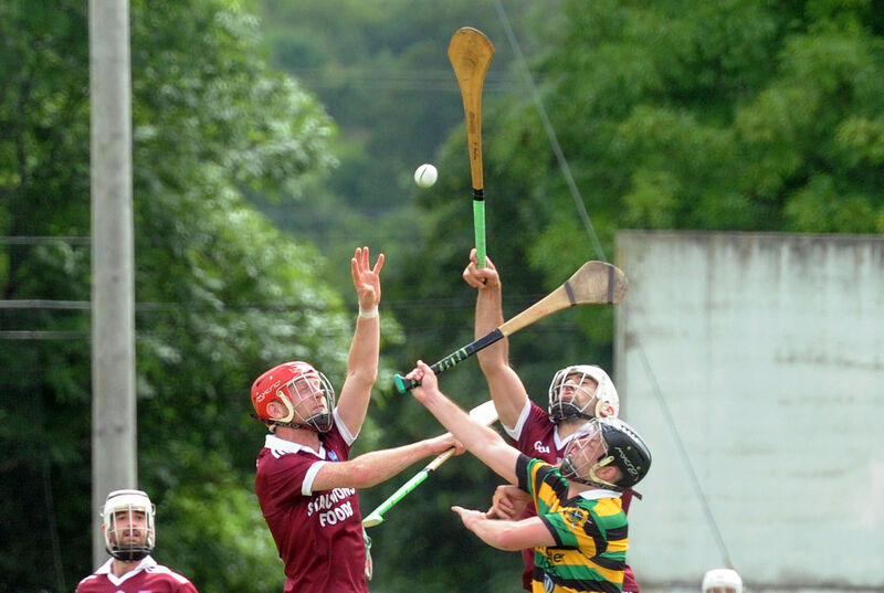 Argideen Rangers' Colin Smith and Paudie Butler going high for the ball with Glen Rovers' David Busteed in the Cork IAHC at Brinny. Picture Denis Minihane.