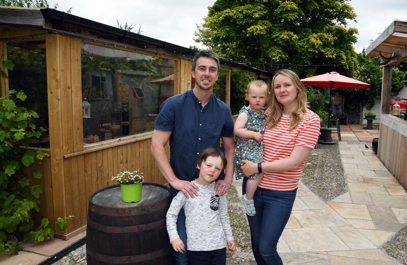Kevin Aherne, proprietor, with his wife Réidín and their children Cuan and Lía in the courtyard at Sage, Midleton, Co. Cork. Kevin Aherne, proprietor, with his wife Réidín and their children Cuan and Lía in the courtyard at Sage, Midleton, Co. Cork.