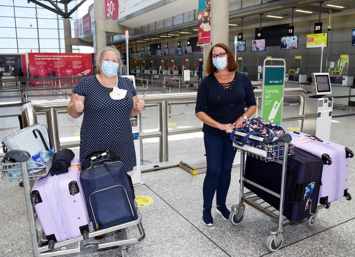 Evelyn Harrington, (left) originally from Rochestown, Cork, heading back to Jamaica after 9 months in Cork and her sister Gillian Quinlan, Blackrock, Cork, going on a holiday to Jamaica from Cork Airport.Picture Denis Minihane. Evelyn Harrington, (left) originally from Rochestown, Cork, heading back to Jamaica after 9 months in Cork and her sister Gillian Quinlan, Blackrock, Cork, going on a holiday to Jamaica from Cork Airport.Picture Denis Minihane.