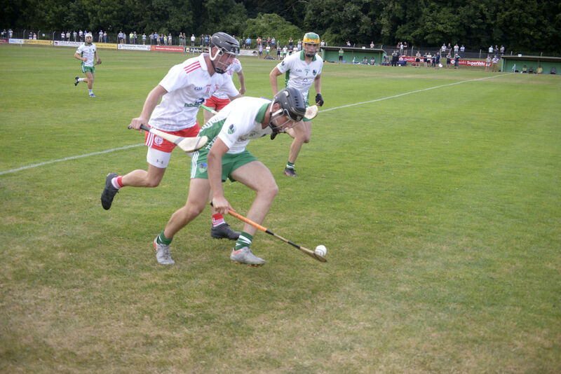 Alan O'Shea under pressure from David Malone. Picture: Denis Boyle Alan O'Shea under pressure from David Malone. Picture: Denis Boyle