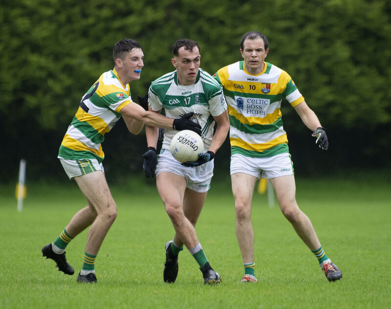 Carbery Rangers players Brian Hodnett and Alan Jennings take on Ilen Rovers' Josh Sheehy in 2020. Picture: Dan Linehan