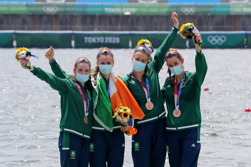 Women's Four Final A: Ireland's Aifric Keogh, Eimear Lambe, Fiona Murtagh and Emily Hegarty celebrate with their bronze medals. 	 ©INPHO/Bryan Keane