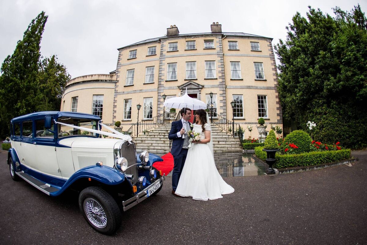 The happy couple outside their wedding reception venue, Maryborough House Hotel. Pictures: Laura and Benny Photography The happy couple outside their wedding reception venue, Maryborough House Hotel. Pictures: Laura and Benny Photography