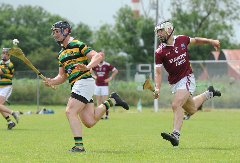 Glen Rovers' Andrew Evans soloing clear of Argideen Rangers' Paudie Butler. Picture Denis Minihane.