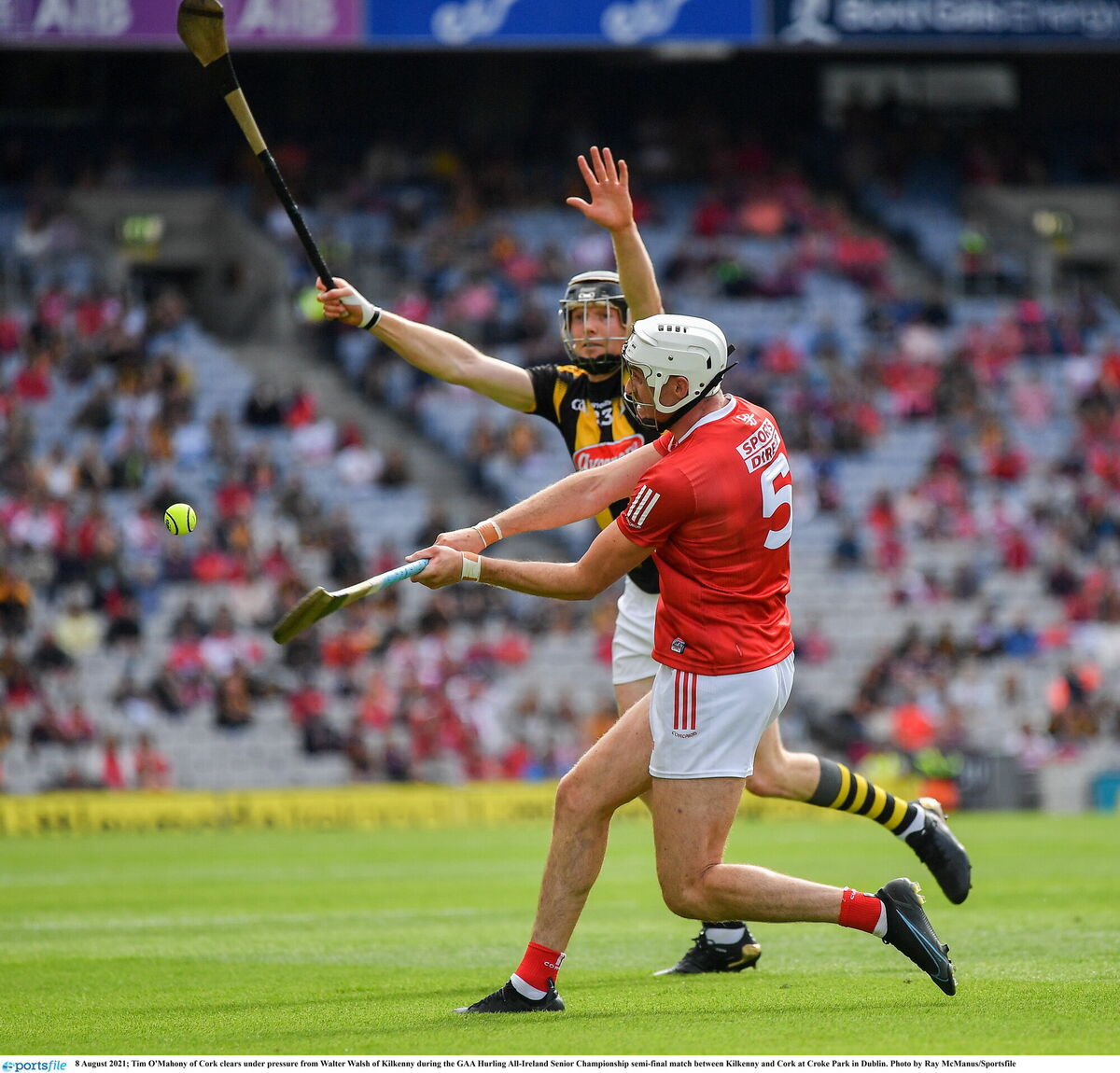 Tim O'Mahony of Cork clears under pressure from Walter Walsh of Kilkenny. Picture: Ray McManus/Sportsfile Tim O'Mahony of Cork clears under pressure from Walter Walsh of Kilkenny. Picture: Ray McManus/Sportsfile
