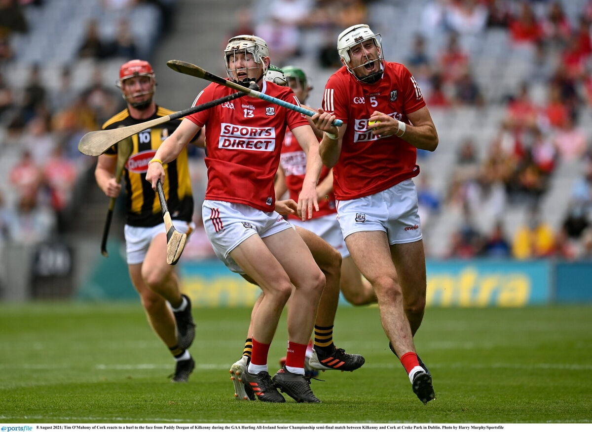 Tim O'Mahony of Cork reacts to a hurley to the face from Paddy Deegan of Kilkenny. Picture: Harry Murphy/Sportsfile