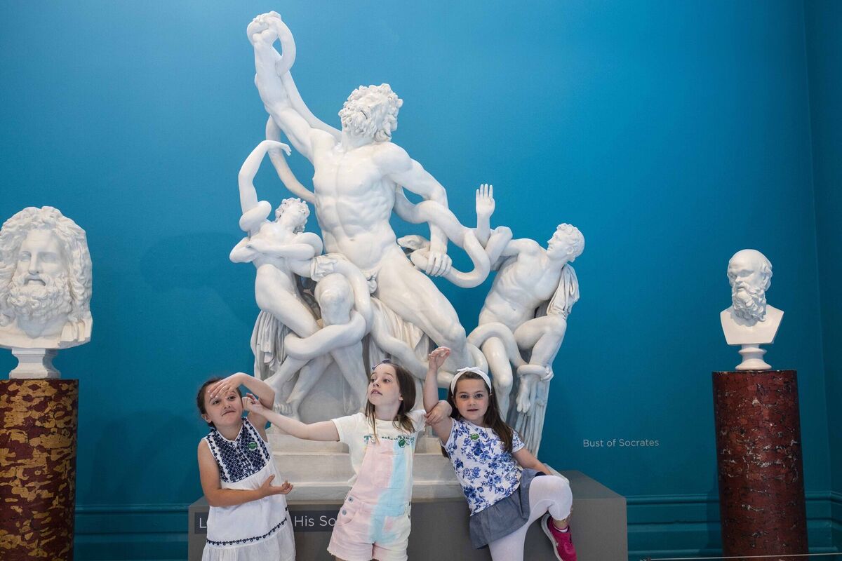 Megan Buckley (8), Laura Sullivan (7) and Holly Donnacliffe (7) celebrate International Youth Day on the Cork City Playful Culture Trail. Pictured as they become statues and play at The Crawford Art Gallery. Picture: Clare Keogh