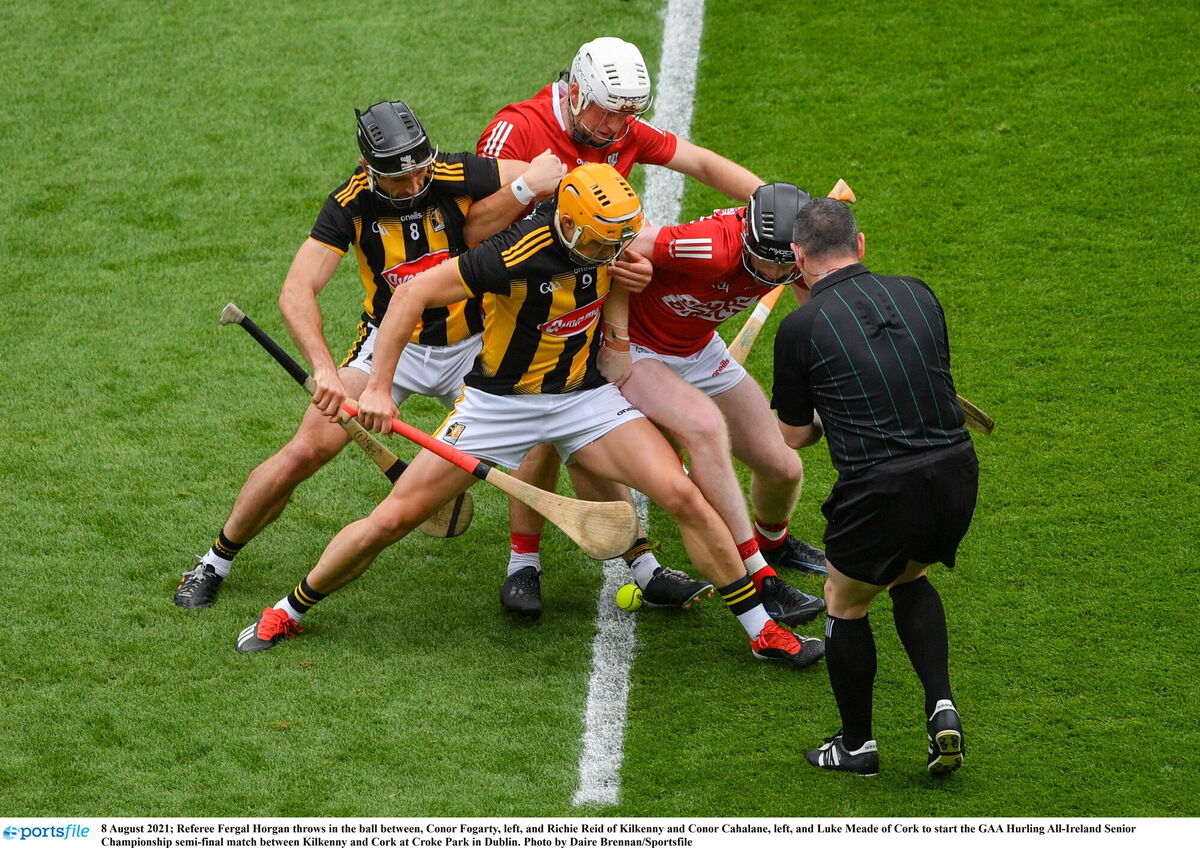 Referee Fergal Horgan throws in the ball between Cork and Kilkenny. Picture: Daire Brennan/Sportsfile