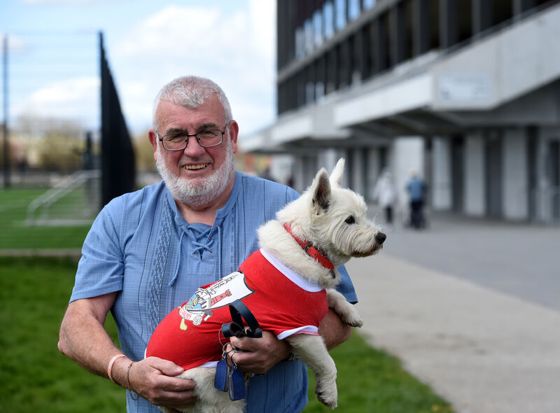Cyril Kavanagh with his dog Holly taking a walk around the home of Cork Gaa at Pairc Ui Chaoimh. Pic; Larry Cummins.