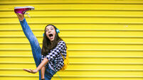 Beautiful girl dancing to the music