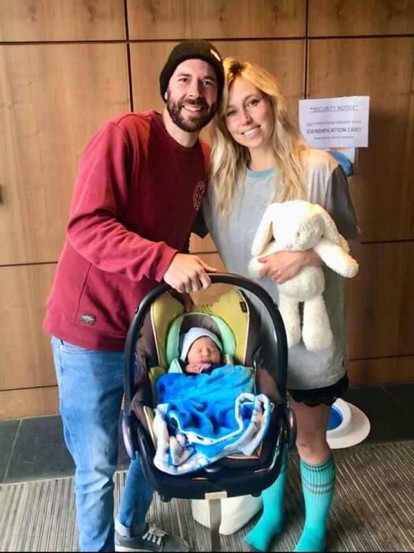 Cork model Serena Lee, her husband Andrew Jolly and their new baby Koa. 