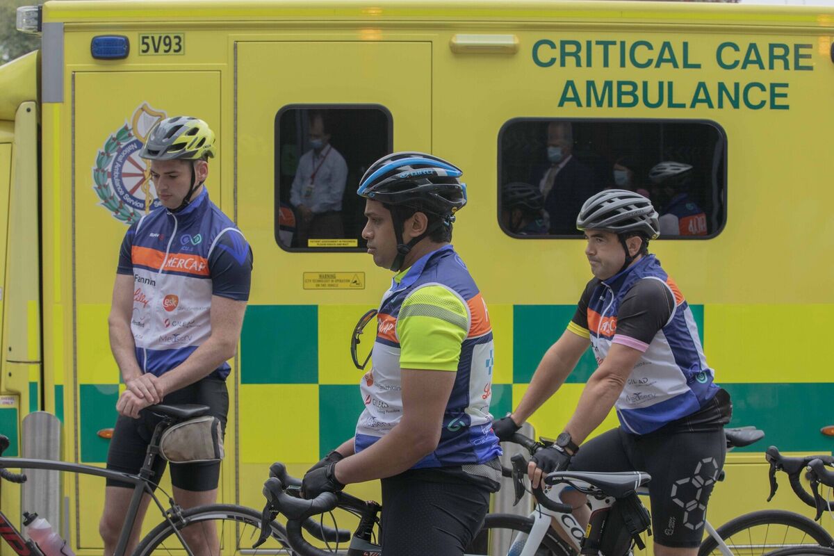 Dr. Paul Ryan, Dr Sham Direkz and Dr. Ivan Hayes pictured during a moment of silence to rememeber those who lost their lives to Covid 19 at Cork University Hospital.