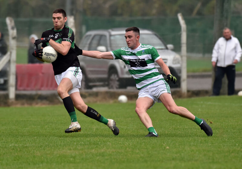 Nemo Rangers' Luke Connolly turns away from Valley Rovers' Tomas O'Brien. Picture: Eddie O'Hare Nemo Rangers' Luke Connolly turns away from Valley Rovers' Tomas O'Brien. Picture: Eddie O'Hare