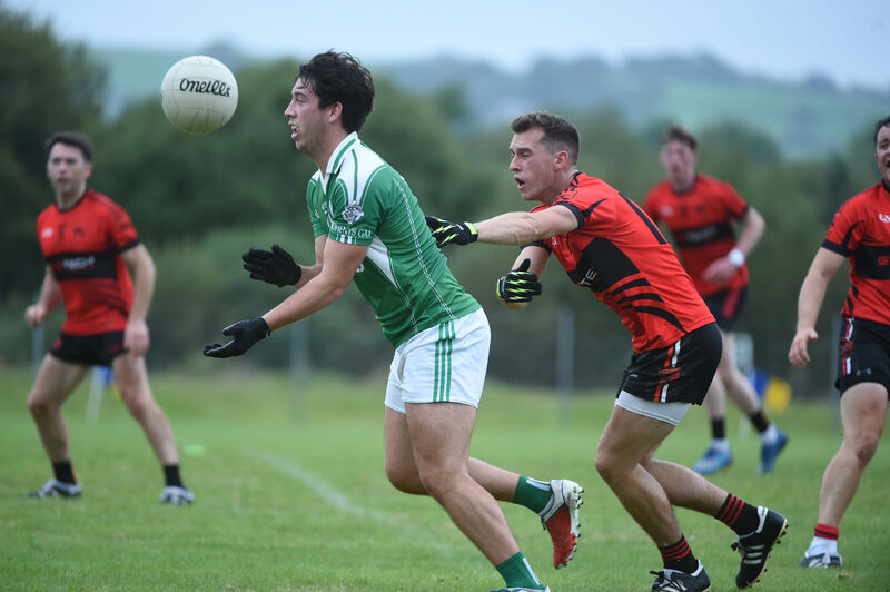  Cullan Barry with possession for Dohenys against Ballingeary. Picture: Larry Cummins