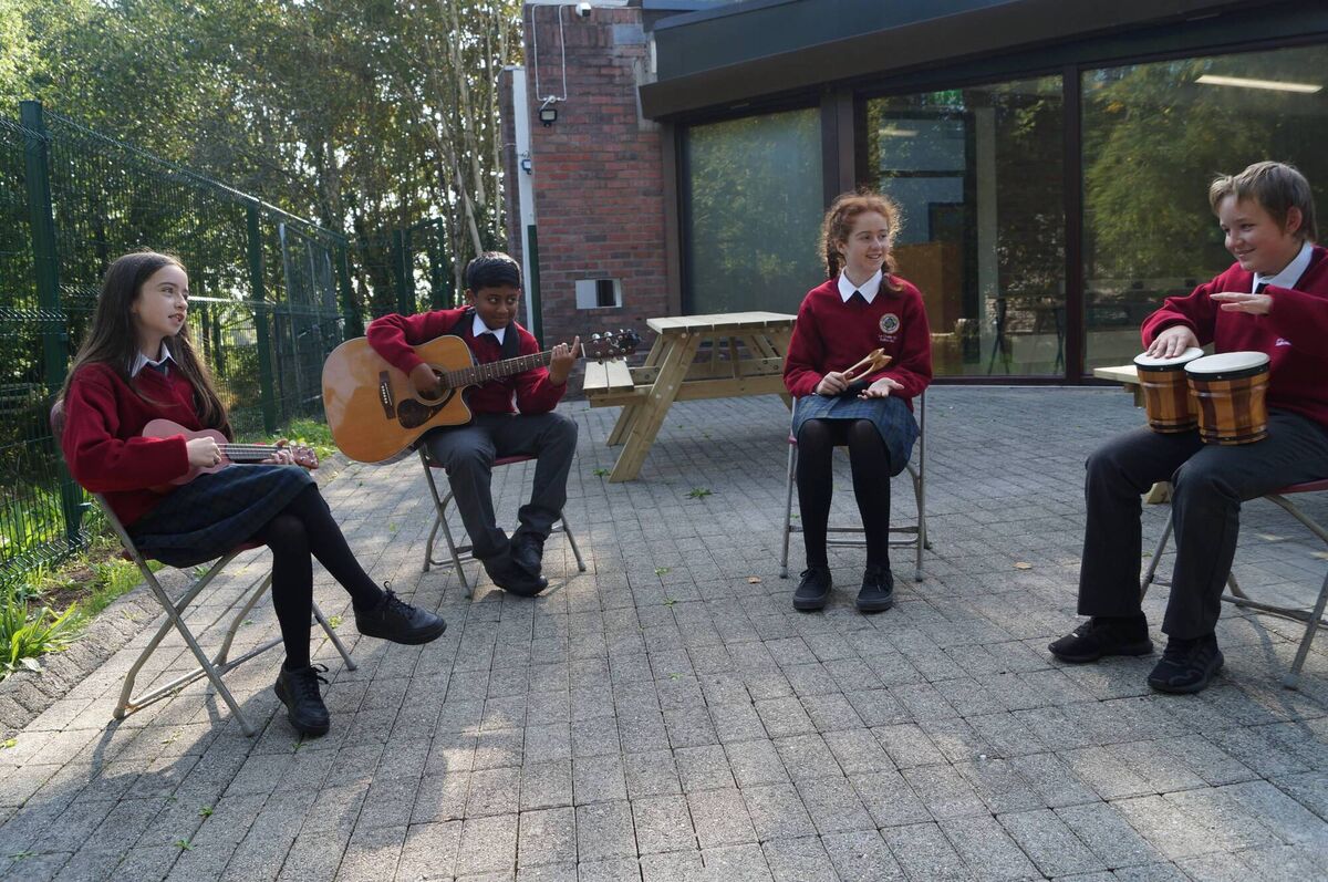 Le Chéile students playing music outdoors. Left to right: Kayleigh Ryan, Sam Varghese, Kate Maguire and Valdy Kazmierczak. Le Chéile students playing music outdoors. Left to right: Kayleigh Ryan, Sam Varghese, Kate Maguire and Valdy Kazmierczak.